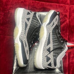 Jordan 11 Low IE “Black Cement”